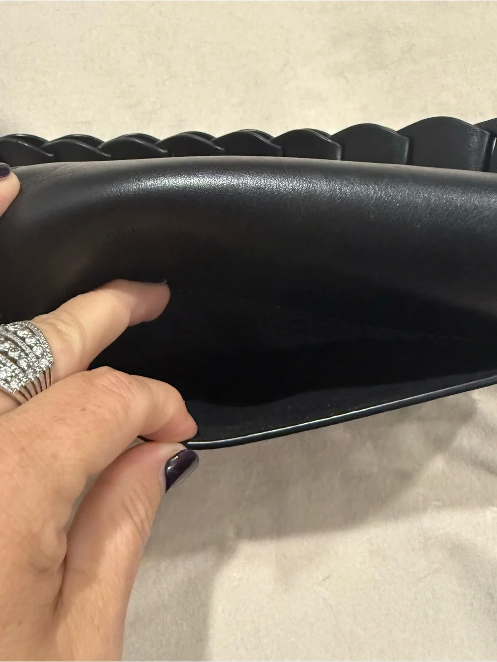⁠MICHAEL KORS Jolene black leather saddle bag with interlocking woven strap